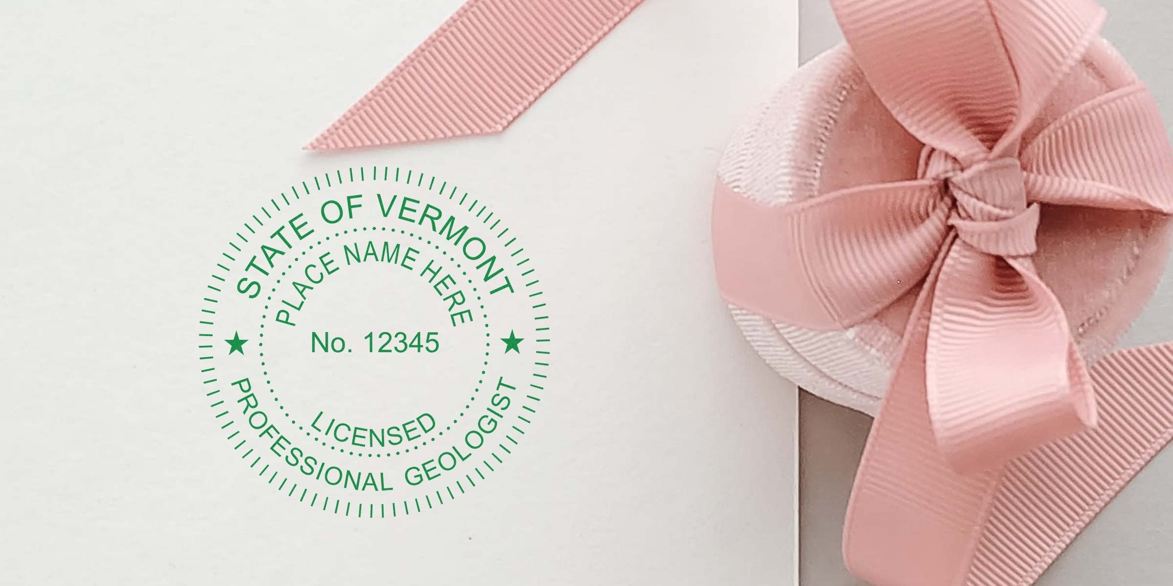 Vermont licensed professional geologist stamp with a pink ribbon, highlighting the Vermont Geologist Stamp and its cost.