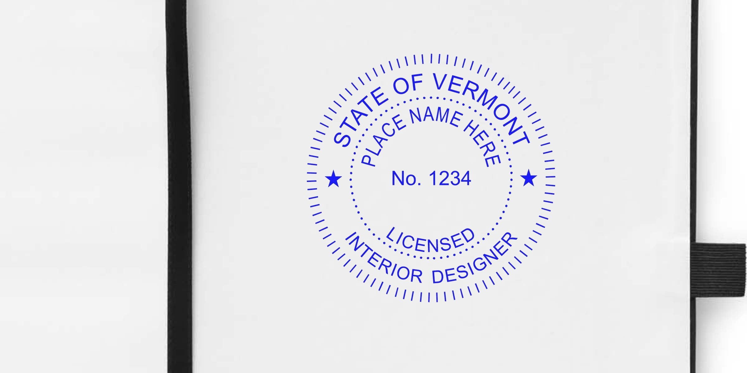 Vermont interior designer stamp on white paper, displaying place name and license number, certifying interior design in Vermont.