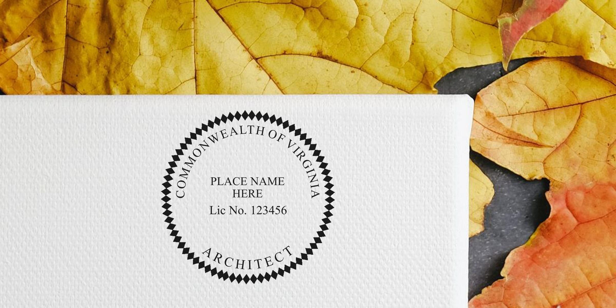 Commonwealth of Virginia architect seal on white textured paper with autumn leaves, showcasing Virginia architecture stamps and seals.