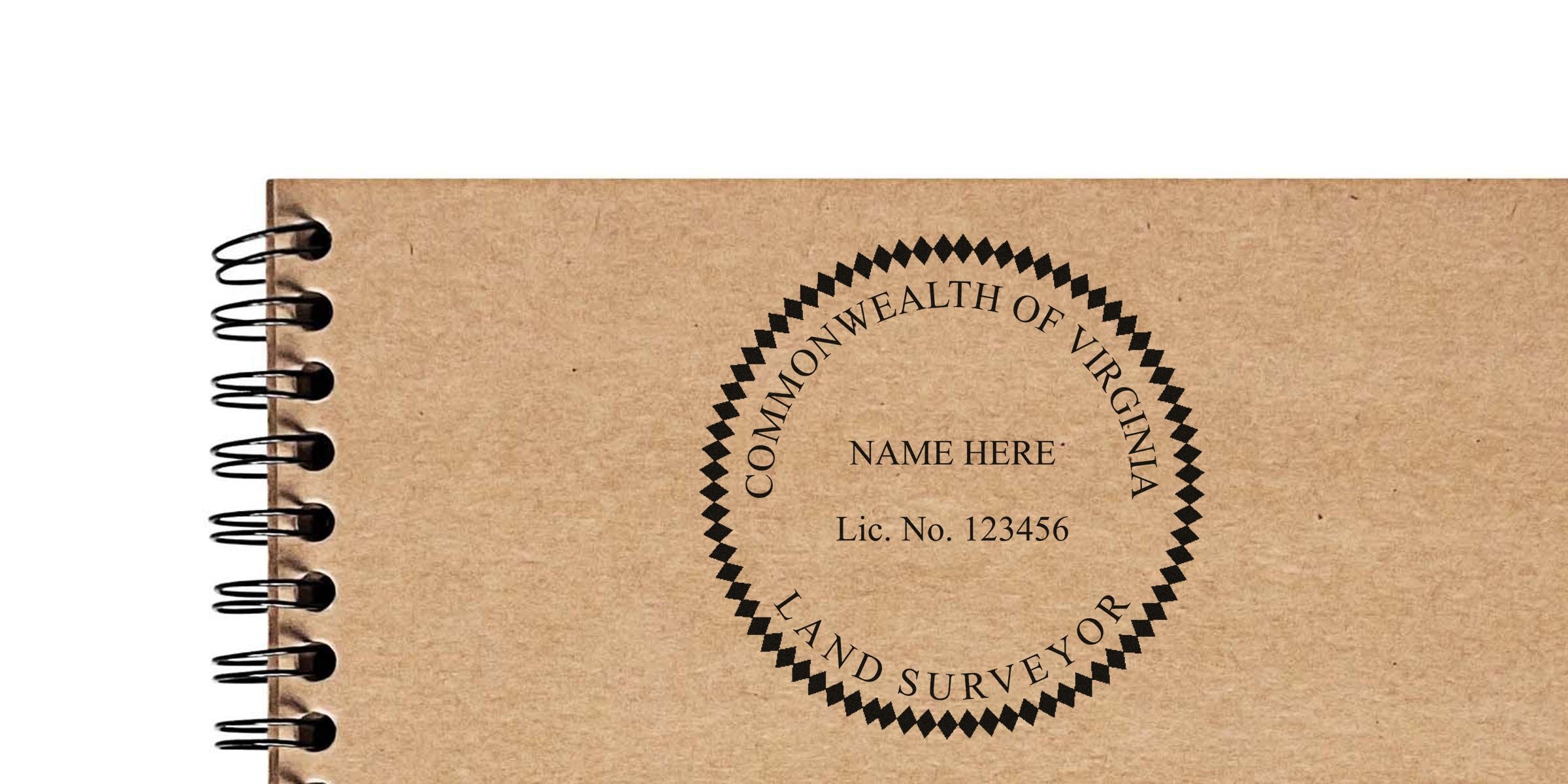 Virginia land surveyor stamp on brown spiral notebook cover, showing Commonwealth of Virginia land surveyor license and complying with Virginia land surveyor stamp laws.