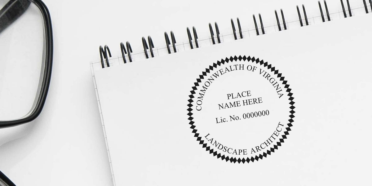 Virginia landscape architect stamp and professional seal shown on a white notebook with black glasses.