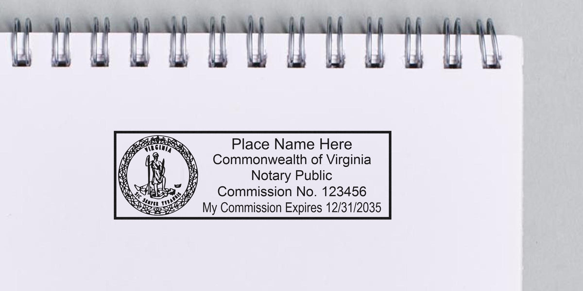 Virginia notary seal stamp with expiration date on white spiral notebook, meeting Virginia notary seal requirements.
