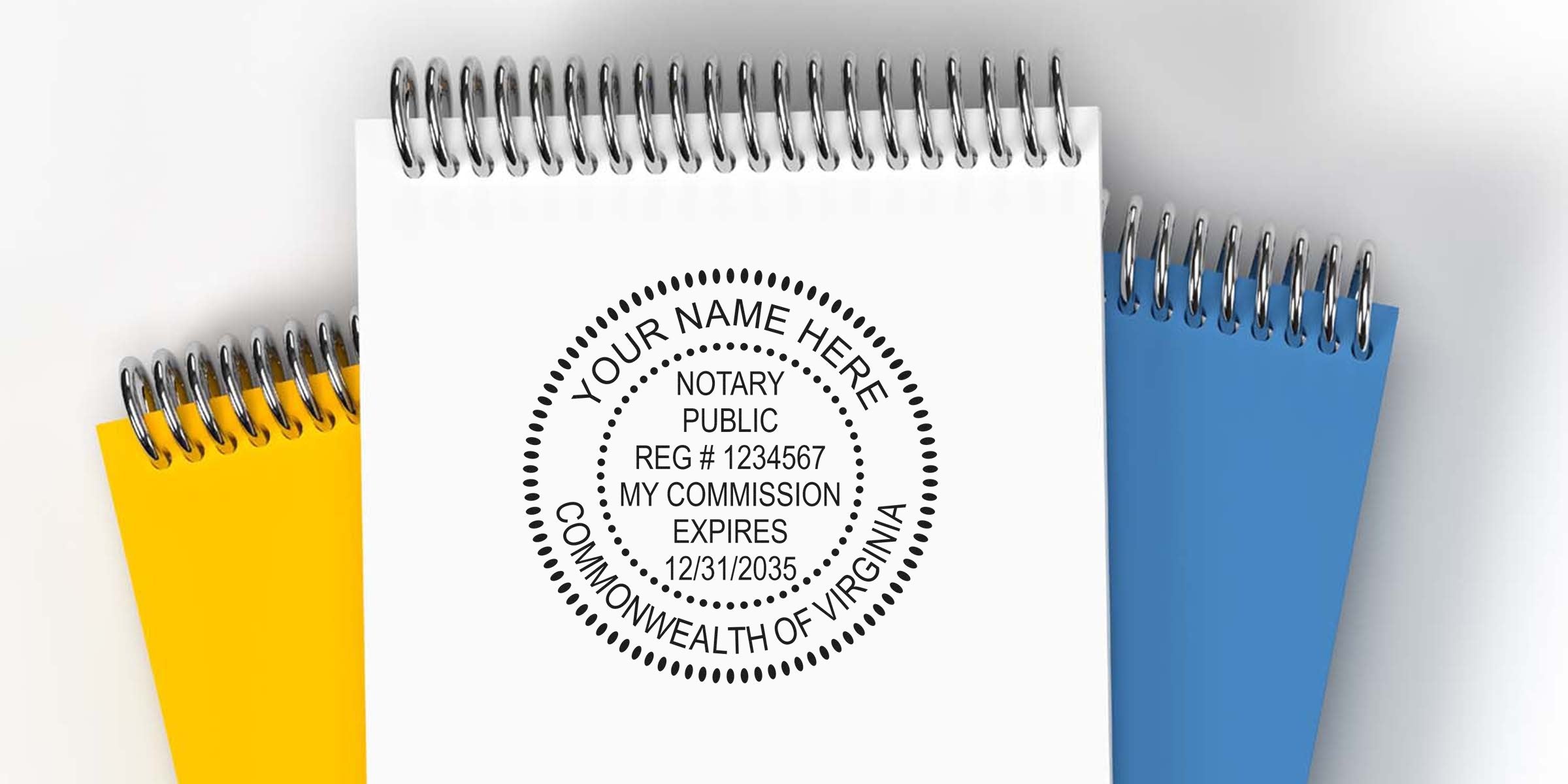 Virginia notary stamp and public seal on spiral notebooks with commission expiration date.