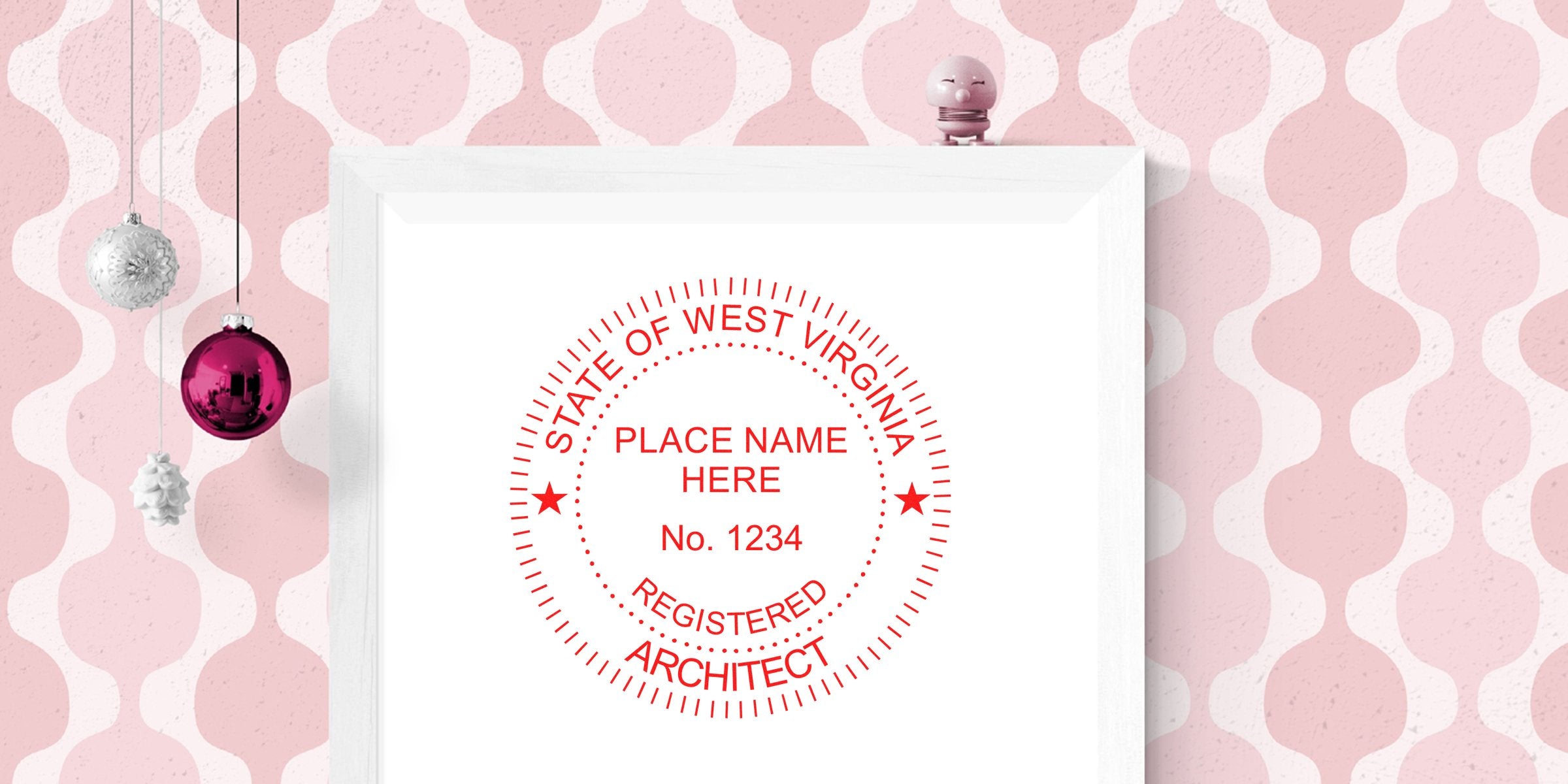 Red West Virginia architect stamp on white frame against pink retro wallpaper, decorated with hanging Christmas ornaments, showcasing the professional architect seal.