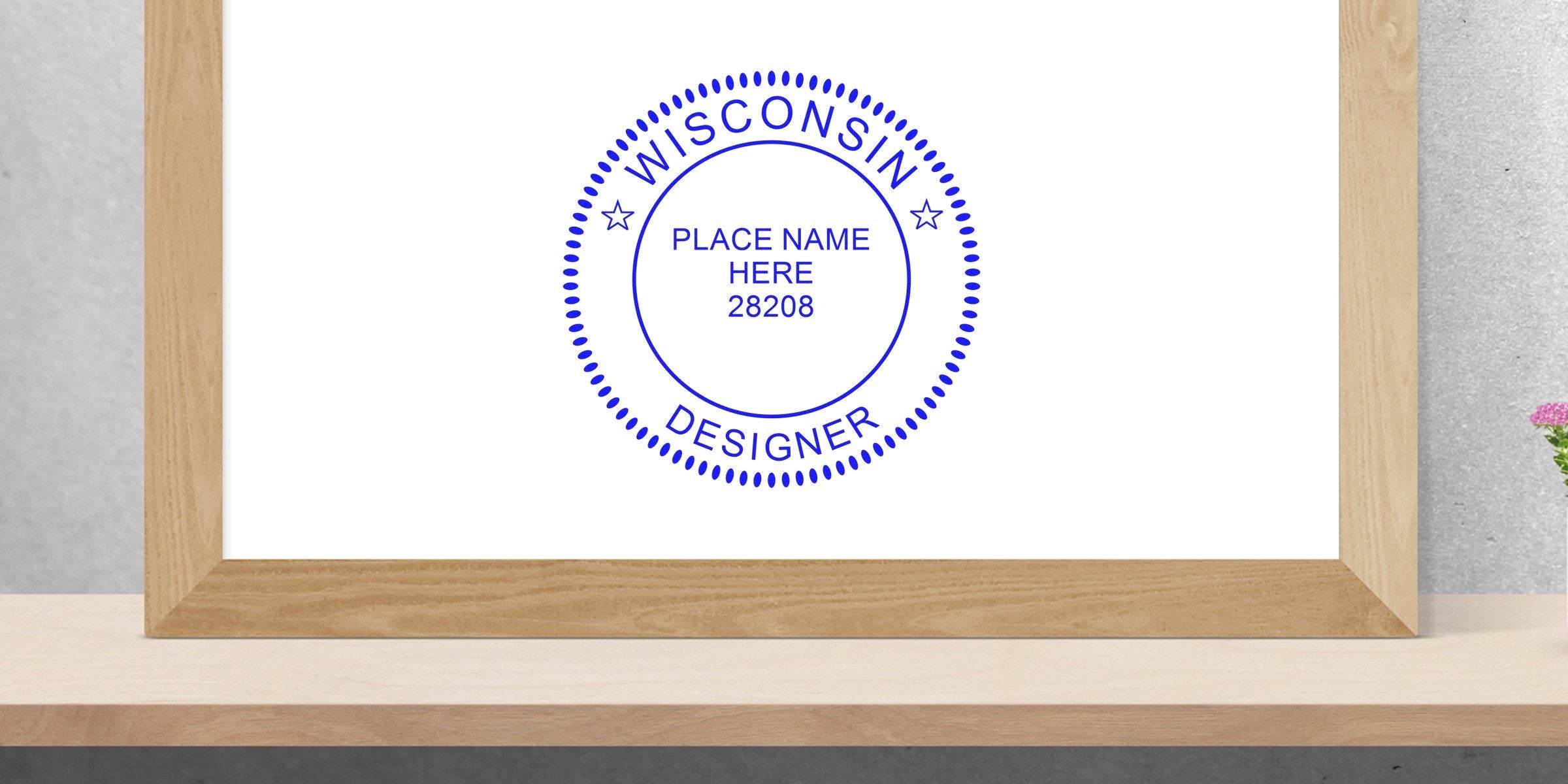 Custom Wisconsin interior designer stamp with location and zip code in wooden frame on shelf, meeting design stamp standards.