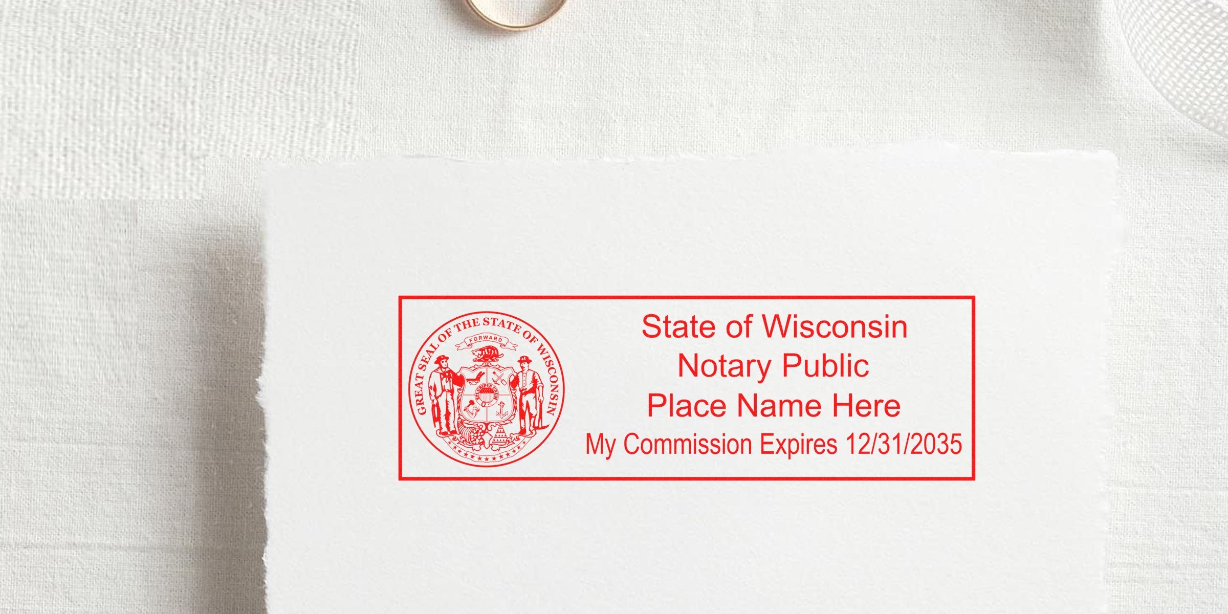 Wisconsin notary seal on white paper showing commission expiration date with key tips for buying a notary stamp.
