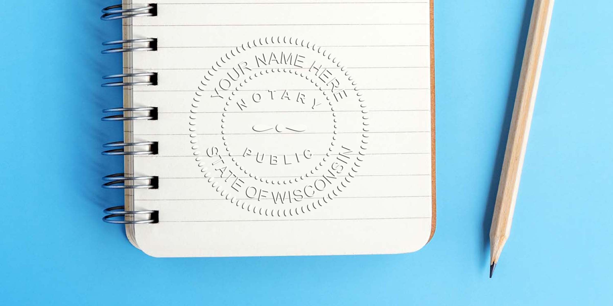Wisconsin notary seal and stamp on spiral notebook with pencil, set on blue background for public notary certification and Wisconsin notary services.