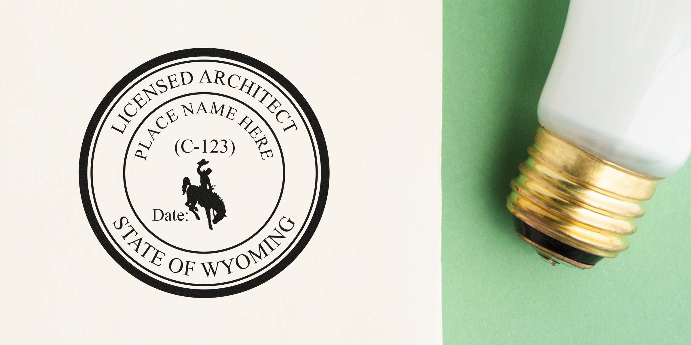 Wyoming architect seal with a cowboy logo next to a light bulb on a green background, highlighting the Wyoming architect seal design.