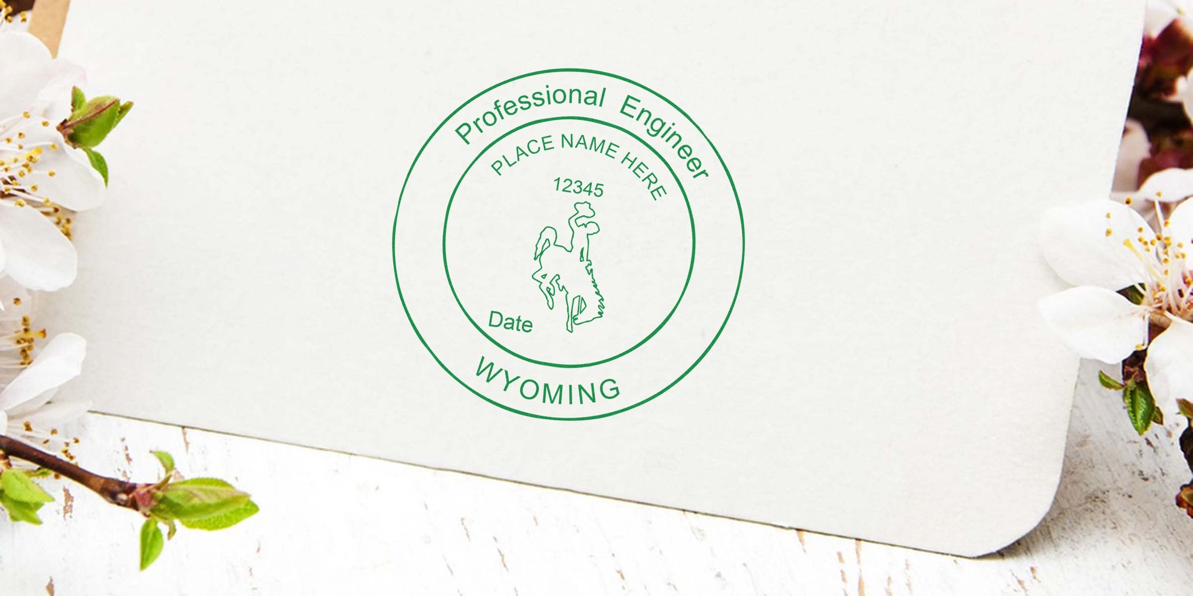 Wyoming engineer stamp with a professional engineer seal on white paper, adorned with floral decoration, symbolizing a Wyoming professional engineering license.