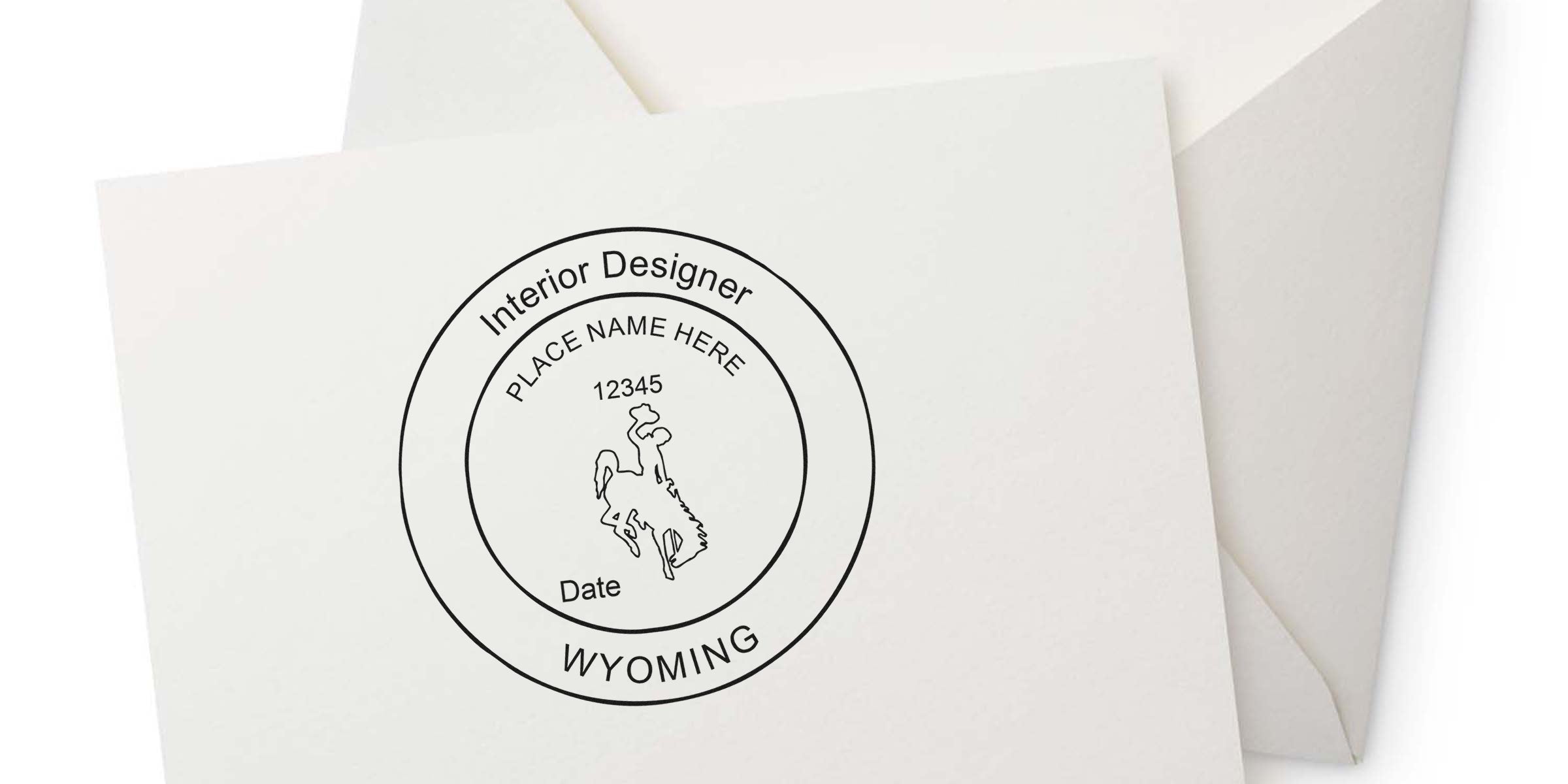 Wyoming Interior Designer Stamp on white envelope with cowboy logo and customizable text, displaying Wyoming Interior Design License.