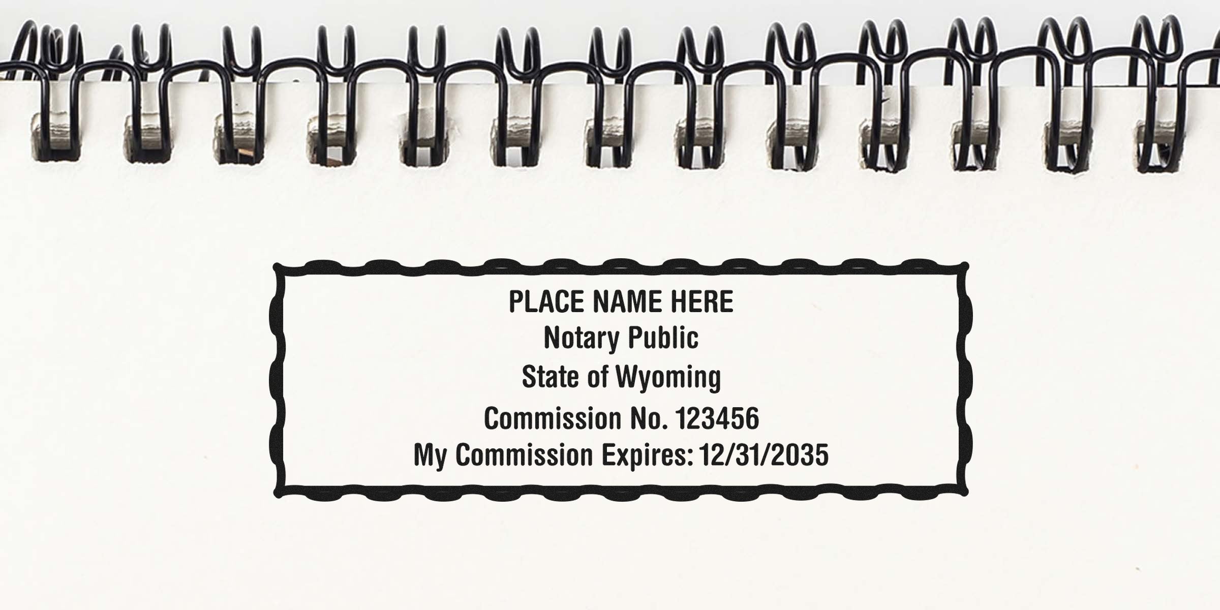 Wyoming notary seal stamped on spiral notebook page showing notary public commission expiring 12/31/2035, part of notary public seal guide.