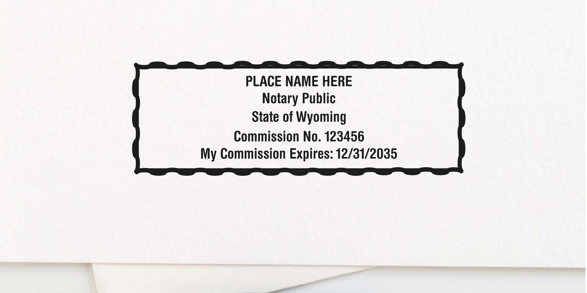 Wyoming notary seal and public stamp with commission number and expiration date on white paper, showing notary stamp options.