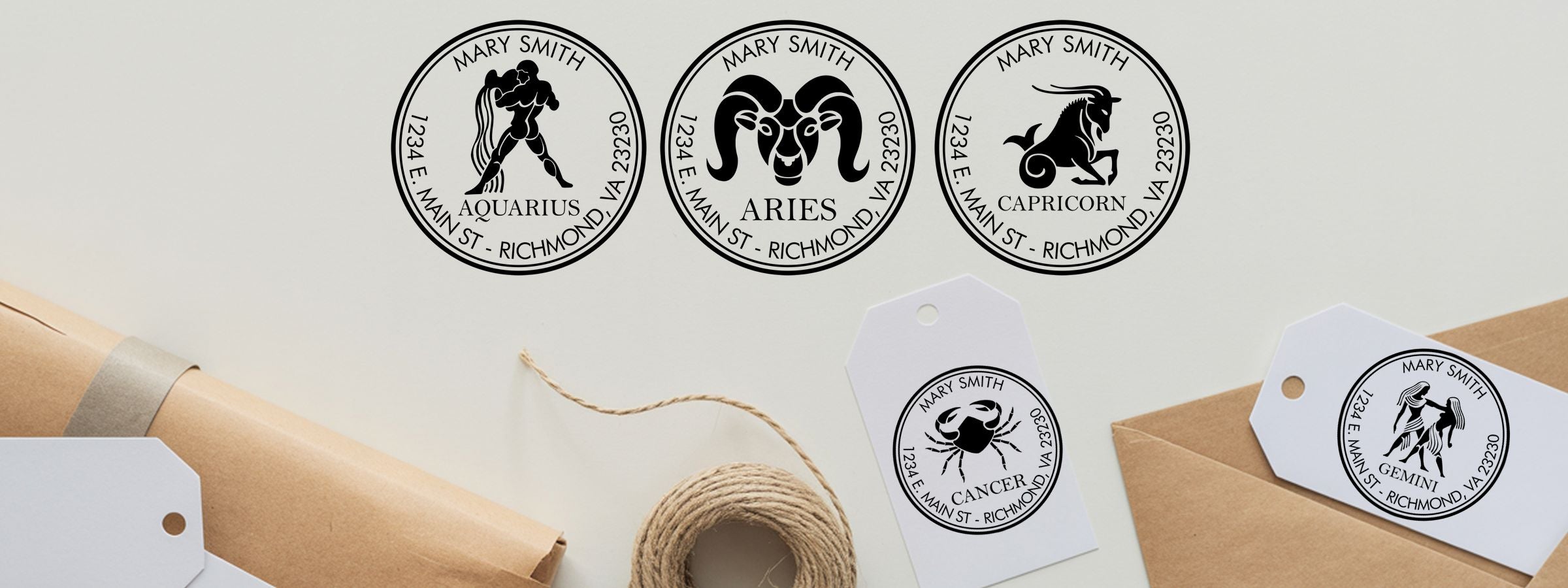 Astrology and Celestial Designer Stamps mockup of black-and-white circular zodiac labels for Mary Smith on envelopes, tags, and twine.