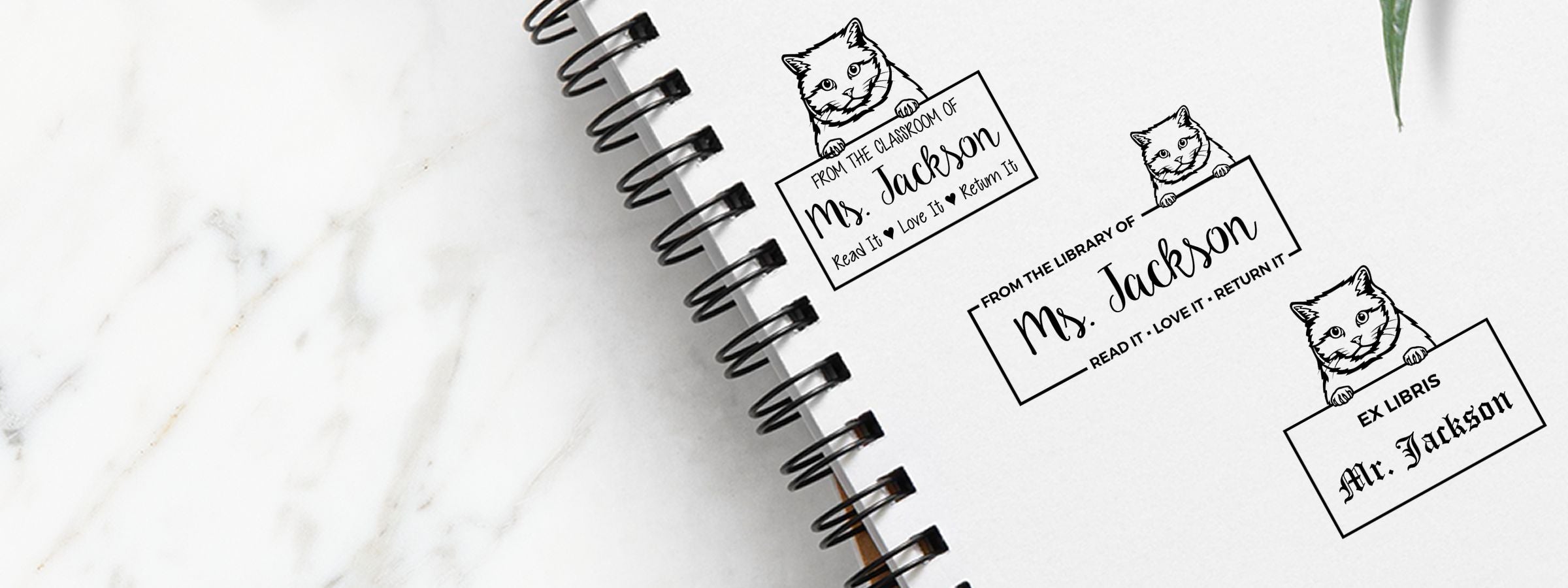Notebook mockup, marble background and spiral binding, with cat-themed labels for Ms. and Mr. Jackson; British Shorthair Cat Stamps and Custom Seals.