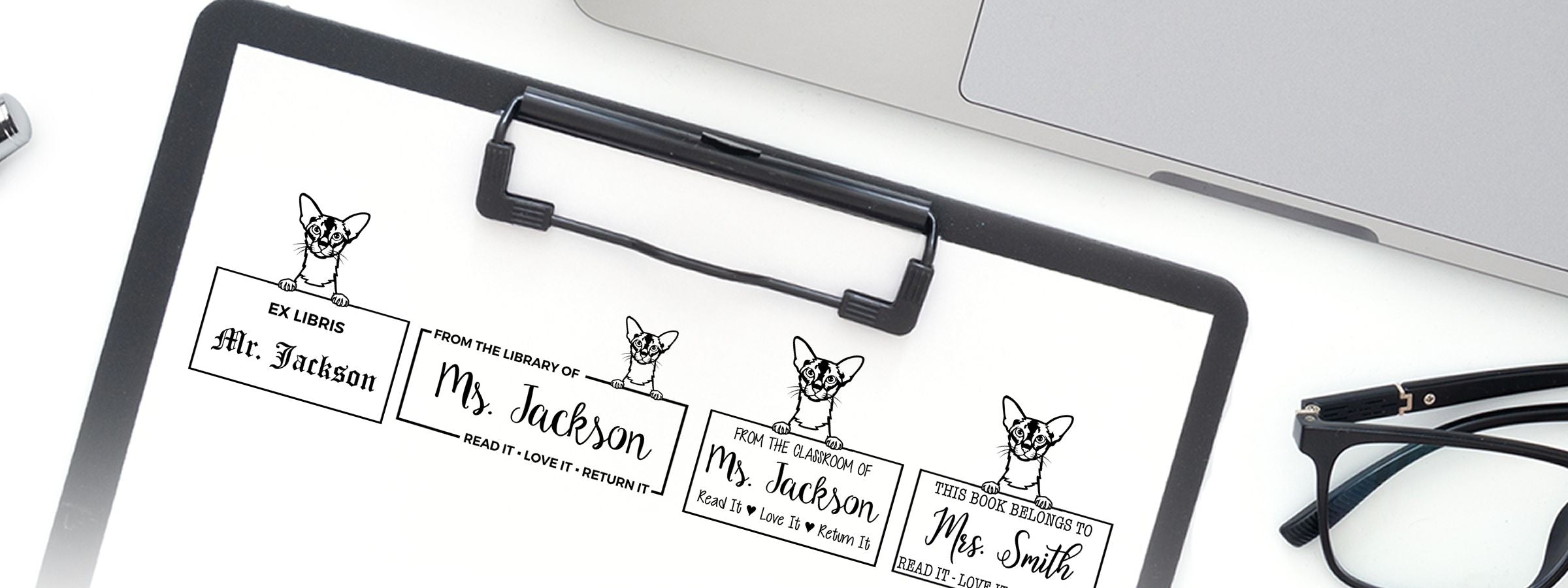 Clipboard with custom bookplate labels featuring a small cat illustration, Colorpoint Shorthair Cat Stamps and Custom Seals, plus a laptop and glasses.