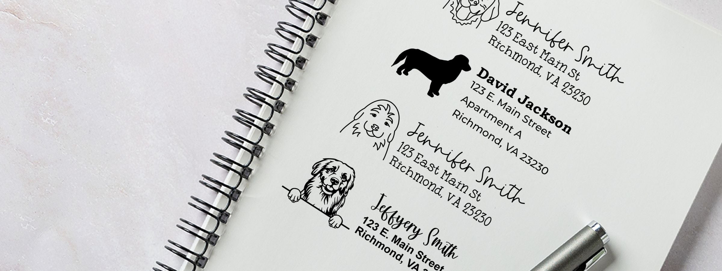 Spiral notebook page with personalized address labels, dog illustrations, and a pen; Golden Retriever Dog Stamps and Custom Seals.