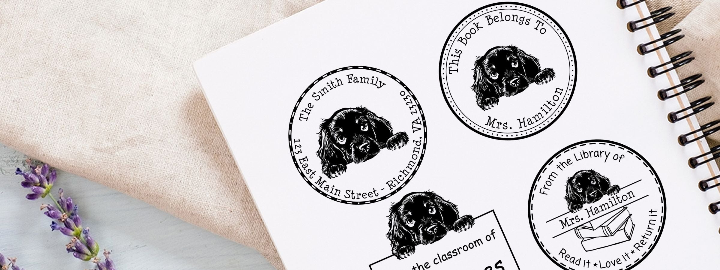Notebook page with four Gordon Setter Dog Stamps and Custom Seals featuring a black dog: family, book-belongs-to, library, and classroom on fabric.