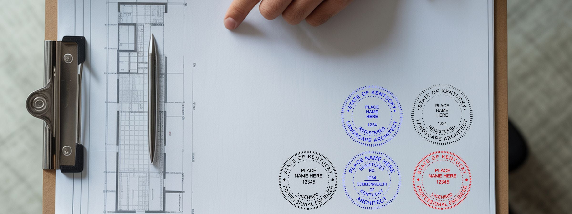 Blueprint clipped to a board with a hand pointing and Kentucky Professional Seals and Stamps for landscape architect, architect, and PE.