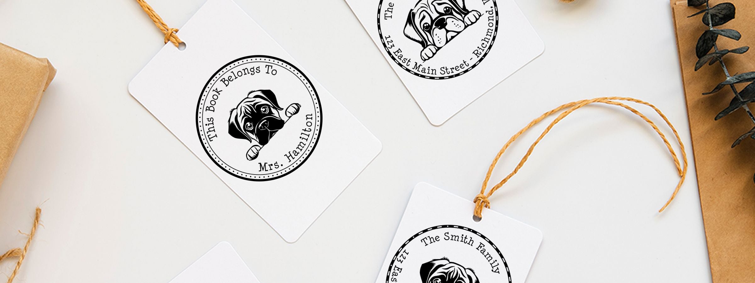 White gift tags with twine, black dog illustrations, and personalized text; Mastiff Dog Stamps and Custom Seals.