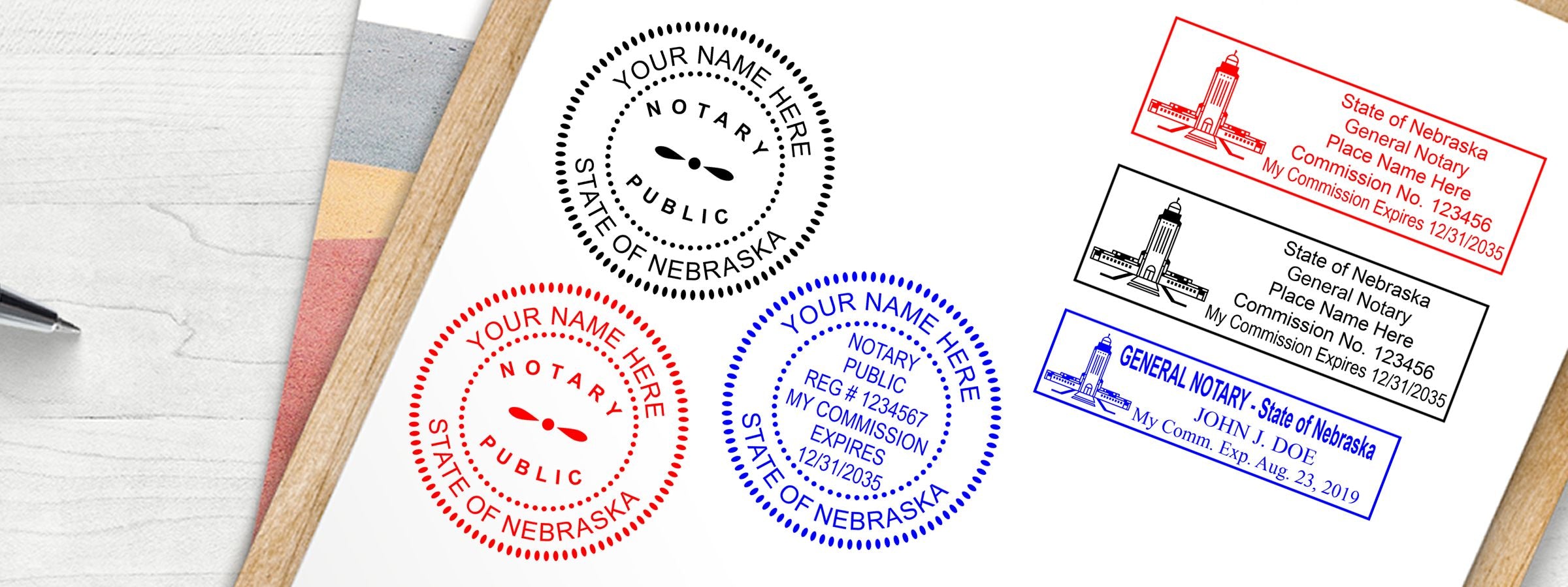 Nebraska Notary Supplies, Stamps and Seals mockup in black, red, and blue on white paper with sample wording, pen, and colored pencils.