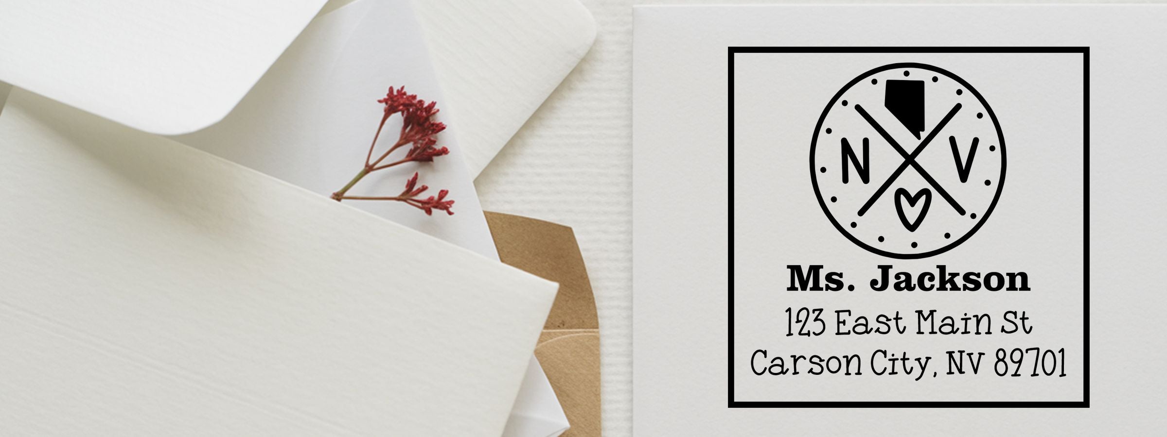 White envelope with red flower beside a mailing label and NV logo for Nevada Designer Stamps and Seals.