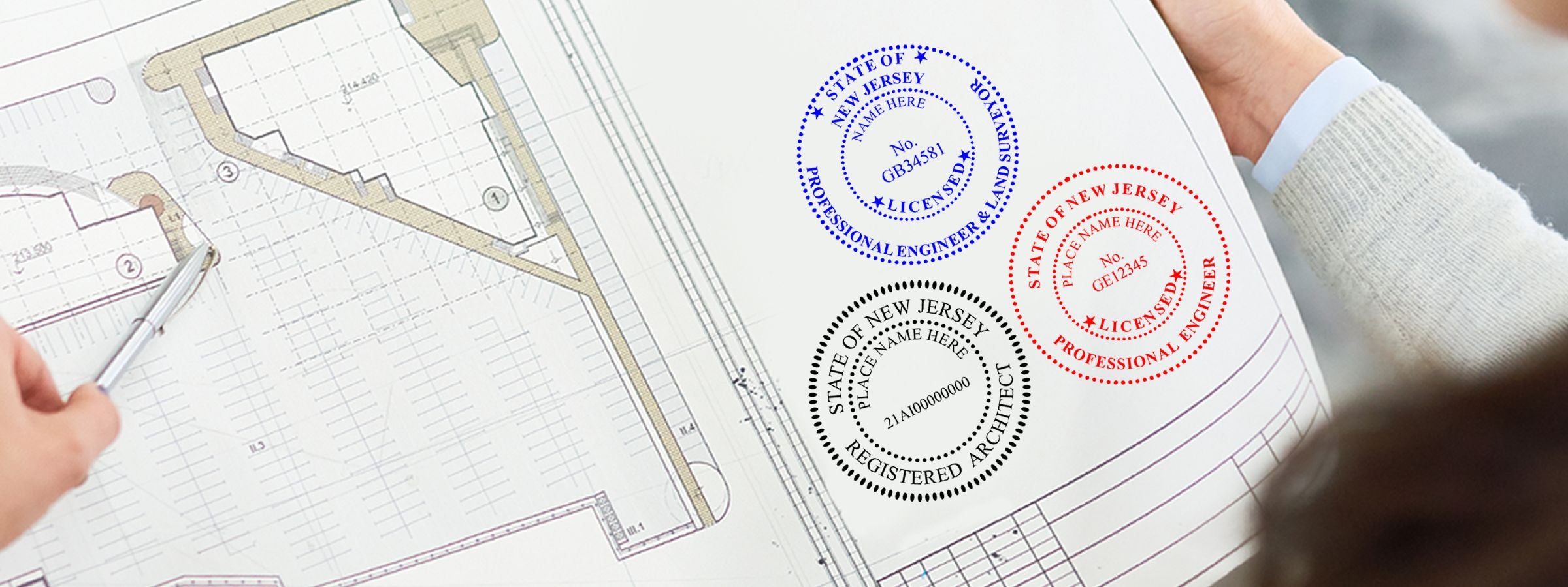 Close-up of site plan review with pen, showing New Jersey Professional Seals and Stamps for a licensed engineer, professional engineer, and architect.