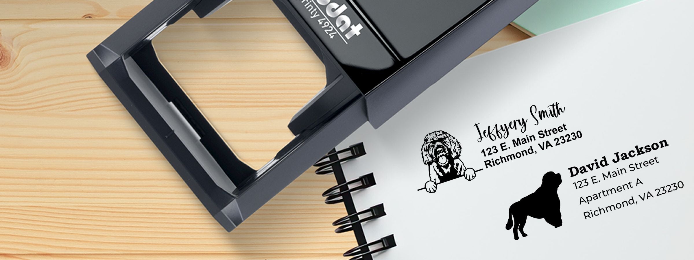 Black self-inking stamp on notebook with custom pet address labels and dog illustrations; Portuguese Water Dog Dog Stamps and Custom Seals.