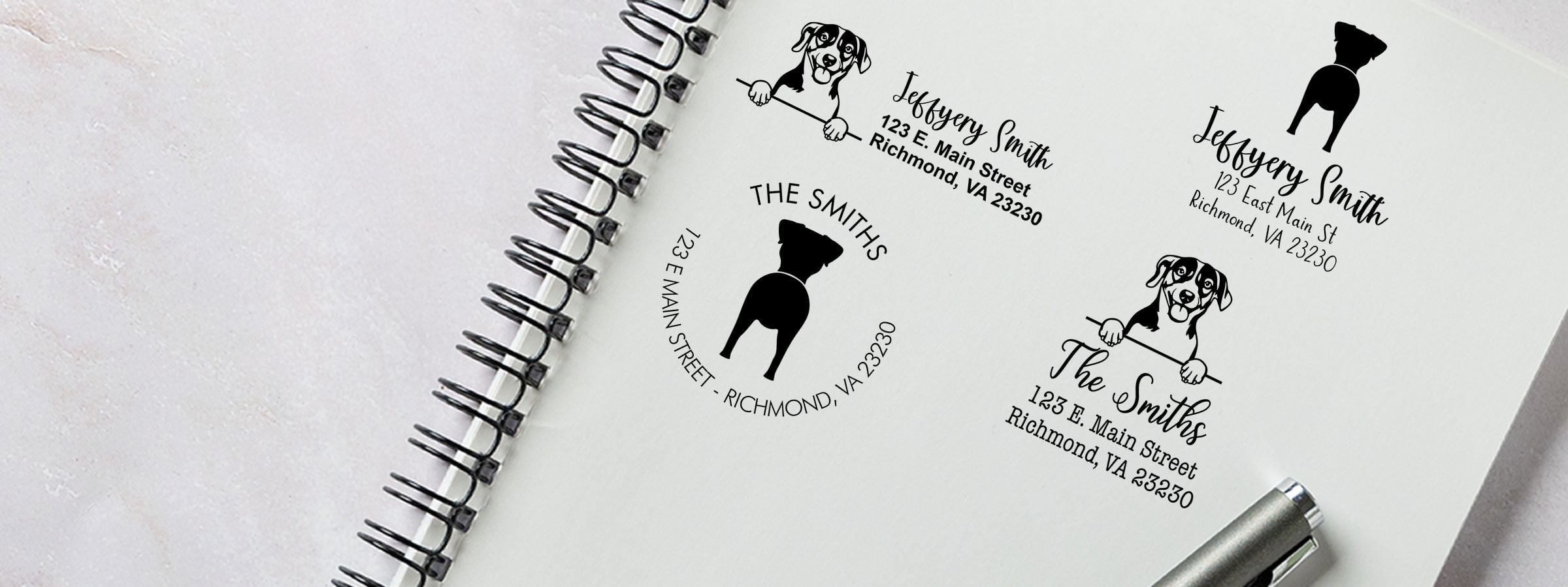 Spiral notebook with black personalized address logo designs, dog silhouettes, Jeffery Smith, The Smiths, pen, and Russell Terrier Dog Stamps and Custom Seals.
