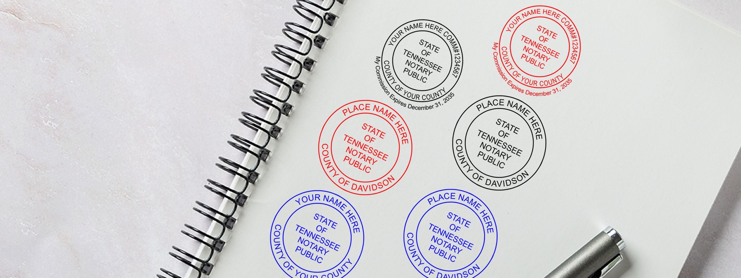 Spiral notebook with six Tennessee notary public seal designs in black, red, and blue; Tennessee Notary Supplies, Stamps and Seals.