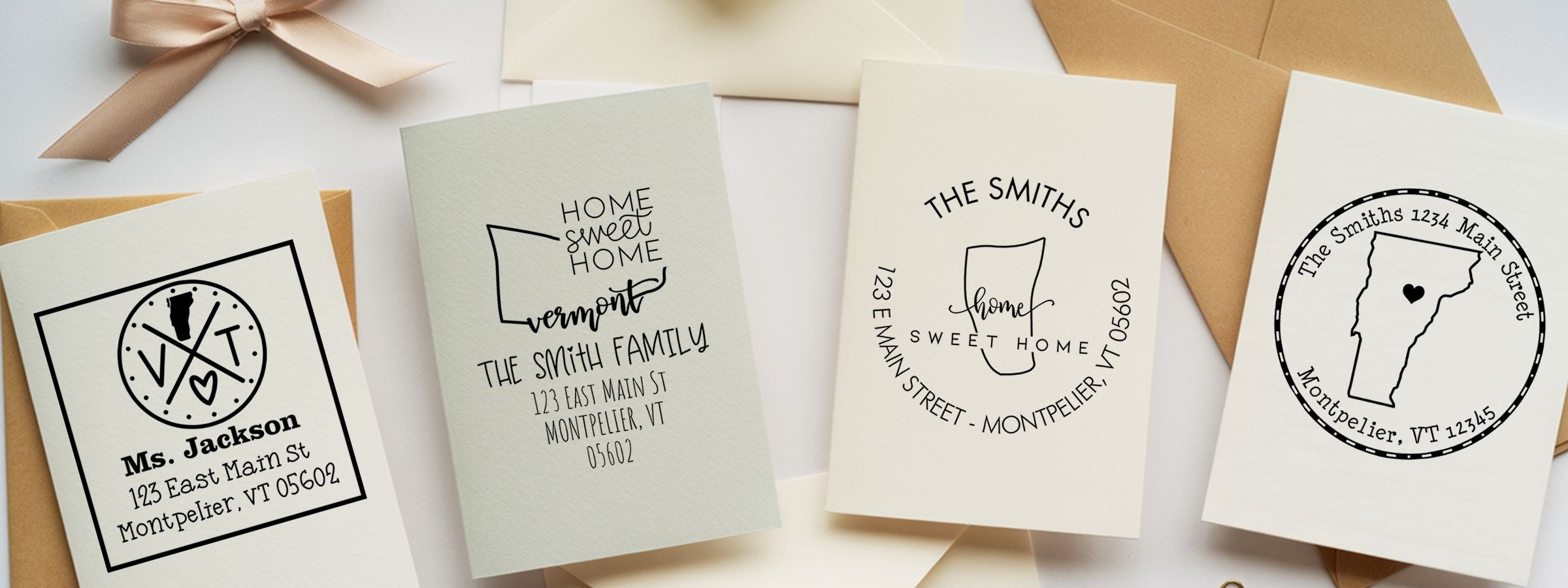 Four personalized greeting cards on envelopes with black line-art, Ms. Jackson, The Smiths, and Vermont Designer Stamps and Seals.