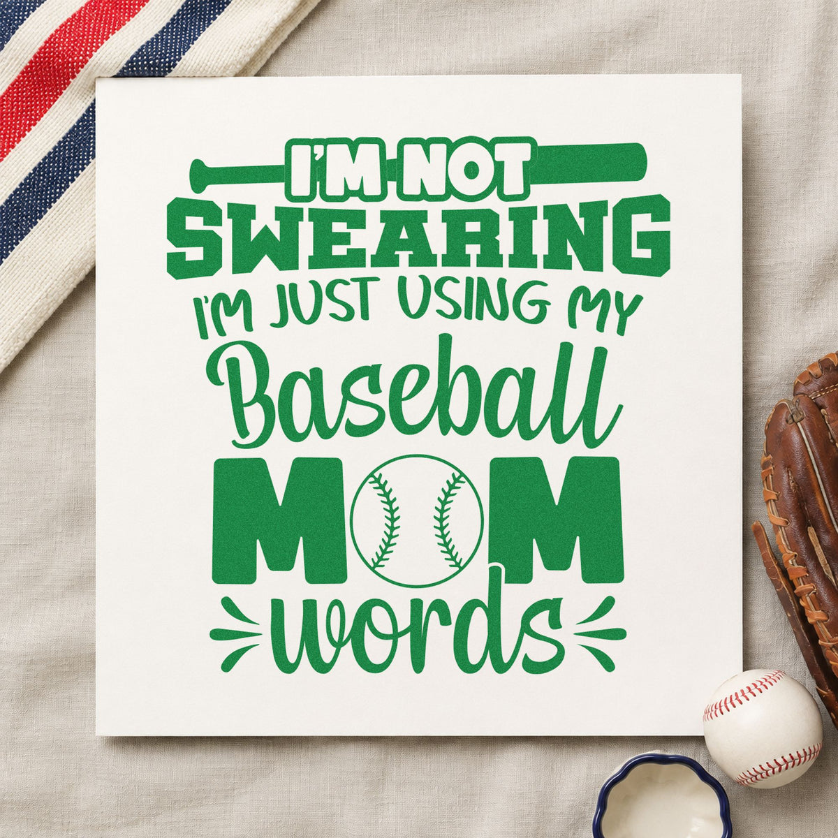Baseball Mom Words craft stamp imprint in green ink on a handmade project, one idea being mother's day cards.