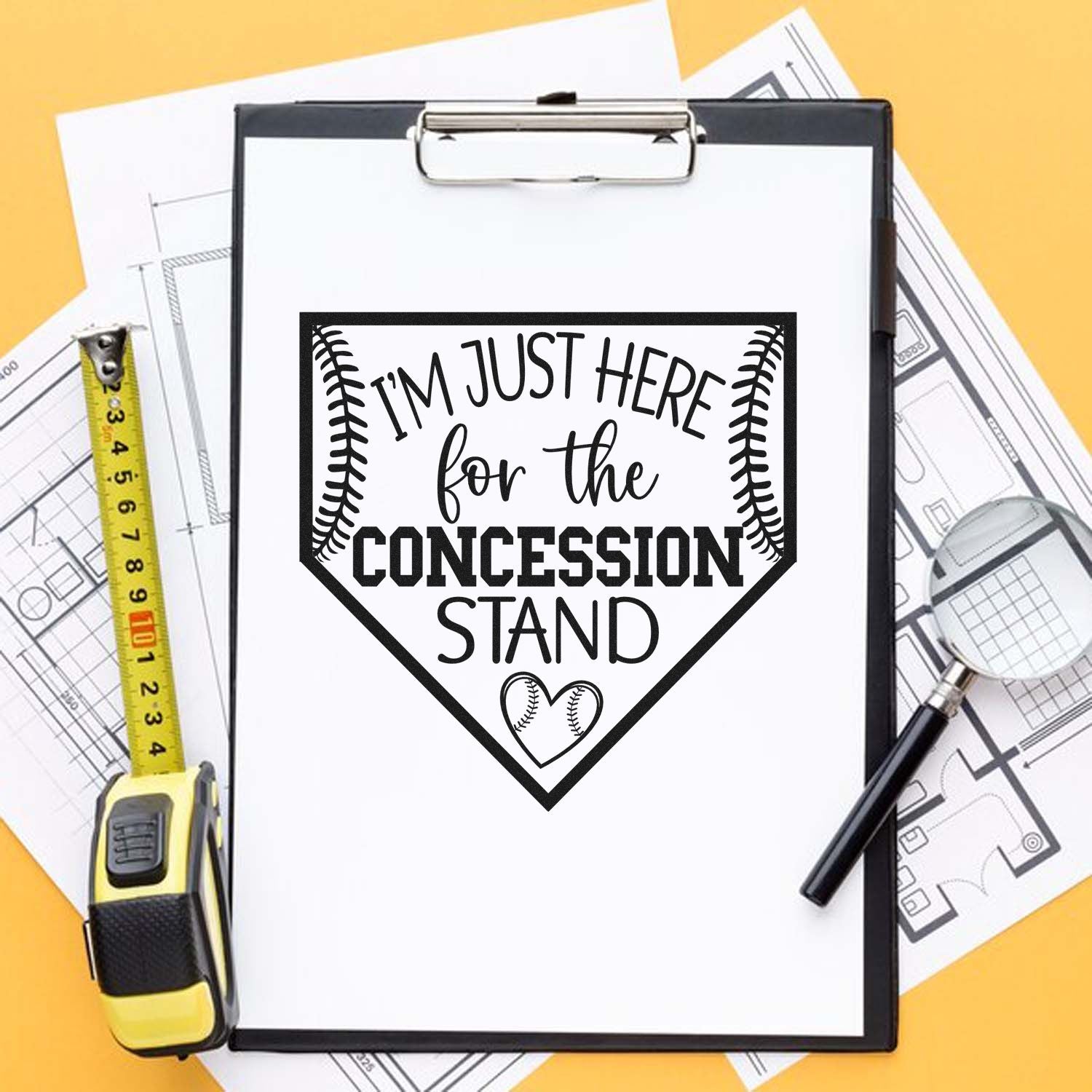 Baseball concession stand rubber stamp mockup featuring Im just here for the concession stand slogan on a clipboard.