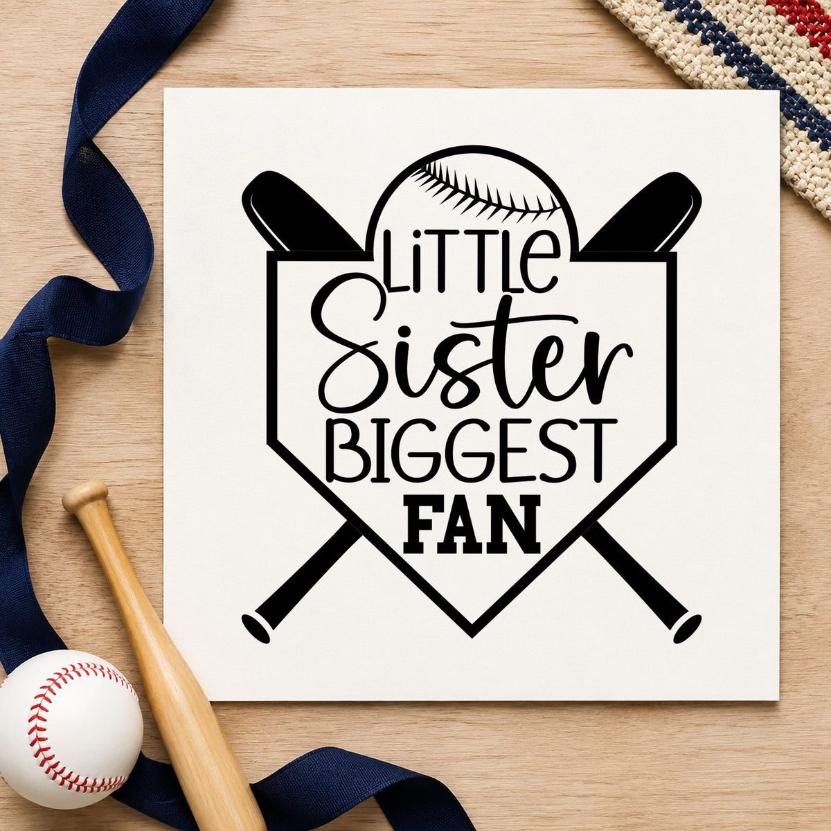 Little Sister Biggest Fan craft stamp imprint in black ink on a handmade project, one idea being scrapbook sibling pages.