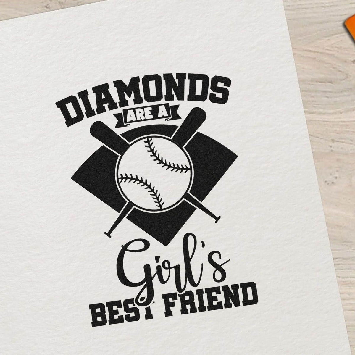 Diamonds Are A Girl's Best Friend Crossed Baseball Bats Premium Wooden Stamp - Vintage Pro imprint stamped in black ink. A baseball diamond, crossed bats, and baseball accompany "Diamonds are a girl's best friend."