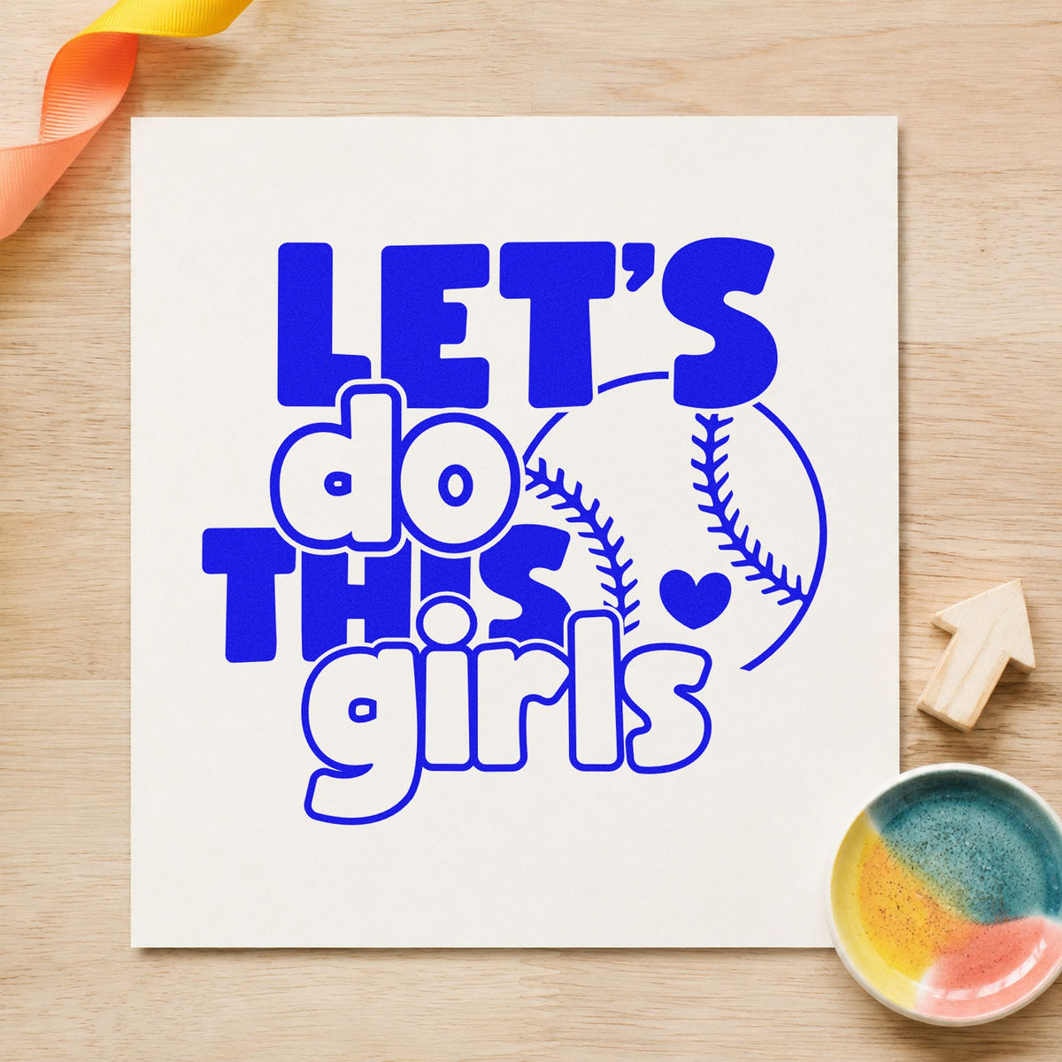 Let's Do This Girls Baseball craft stamp imprinted in blue ink on paper, a design suited to locker door signs.