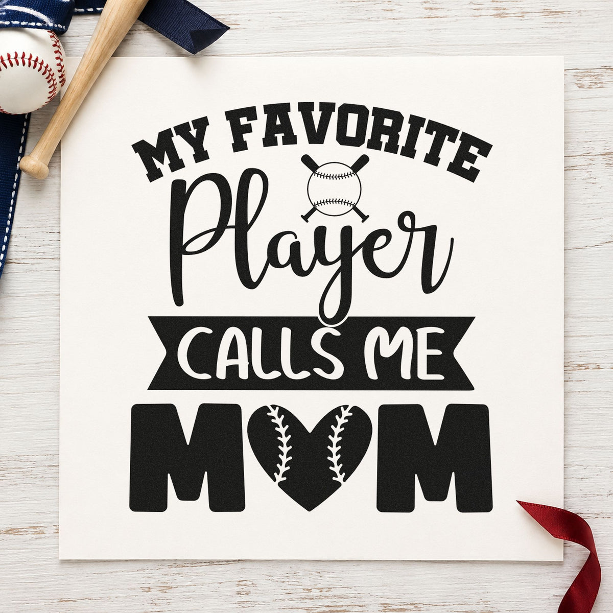 My Favorite Player Calls Me Mom craft stamp imprint in black ink on a handmade project, one idea being scrapbook mom pages.