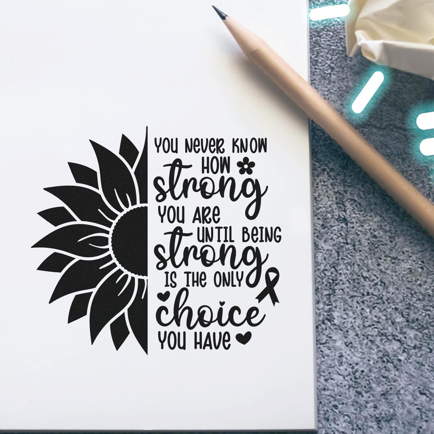 Sunflower rubber stamp with inspirational quote, You never know how strong you are, for cards, journaling, and crafts.