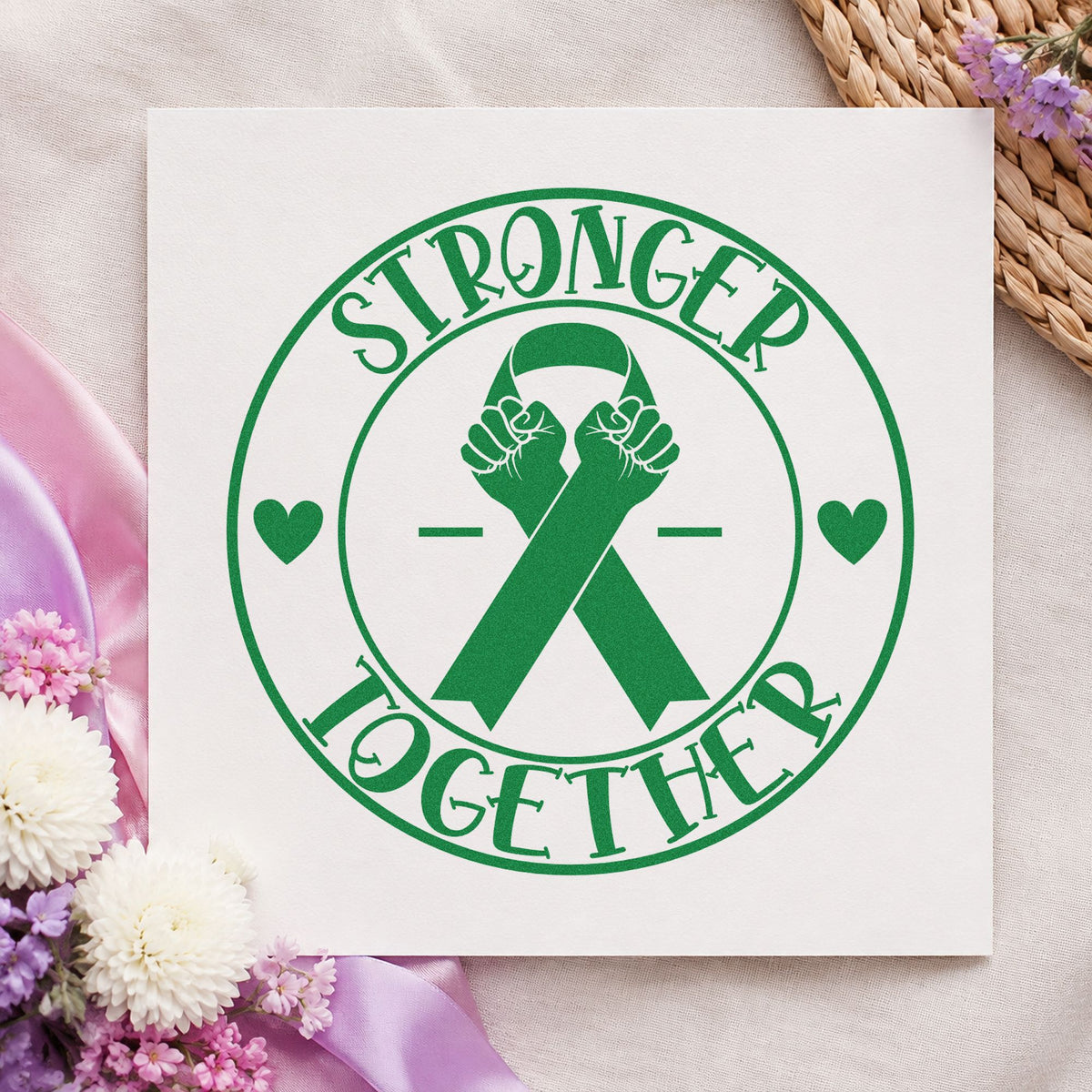 Stronger Together Ribbon Badge craft stamp in green ink on cardstock, an easy option for walk crew shirts.
