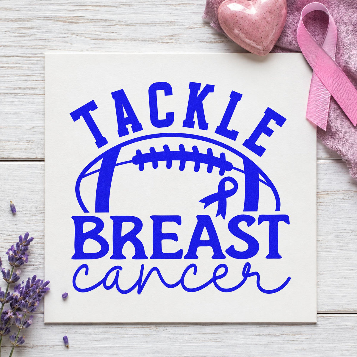 Tackle Breast Cancer Football craft stamp imprinted in blue ink on paper, a design suited to player locker tags.