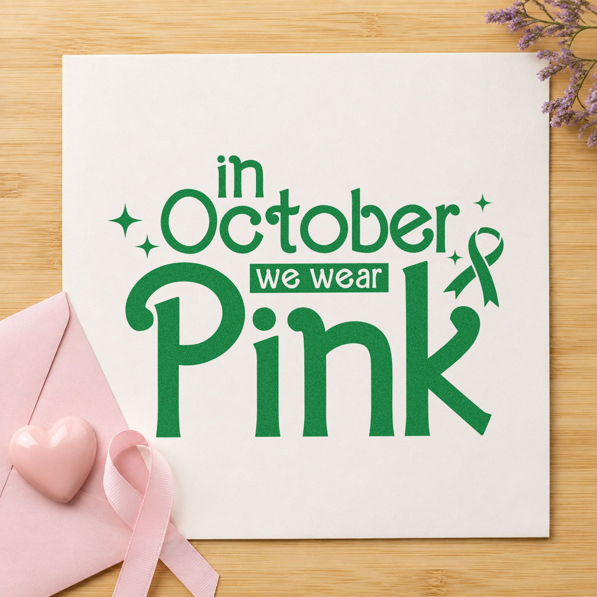 In October We Wear Pink craft stamp imprint in green ink on a handmade project, one idea being front door displays.