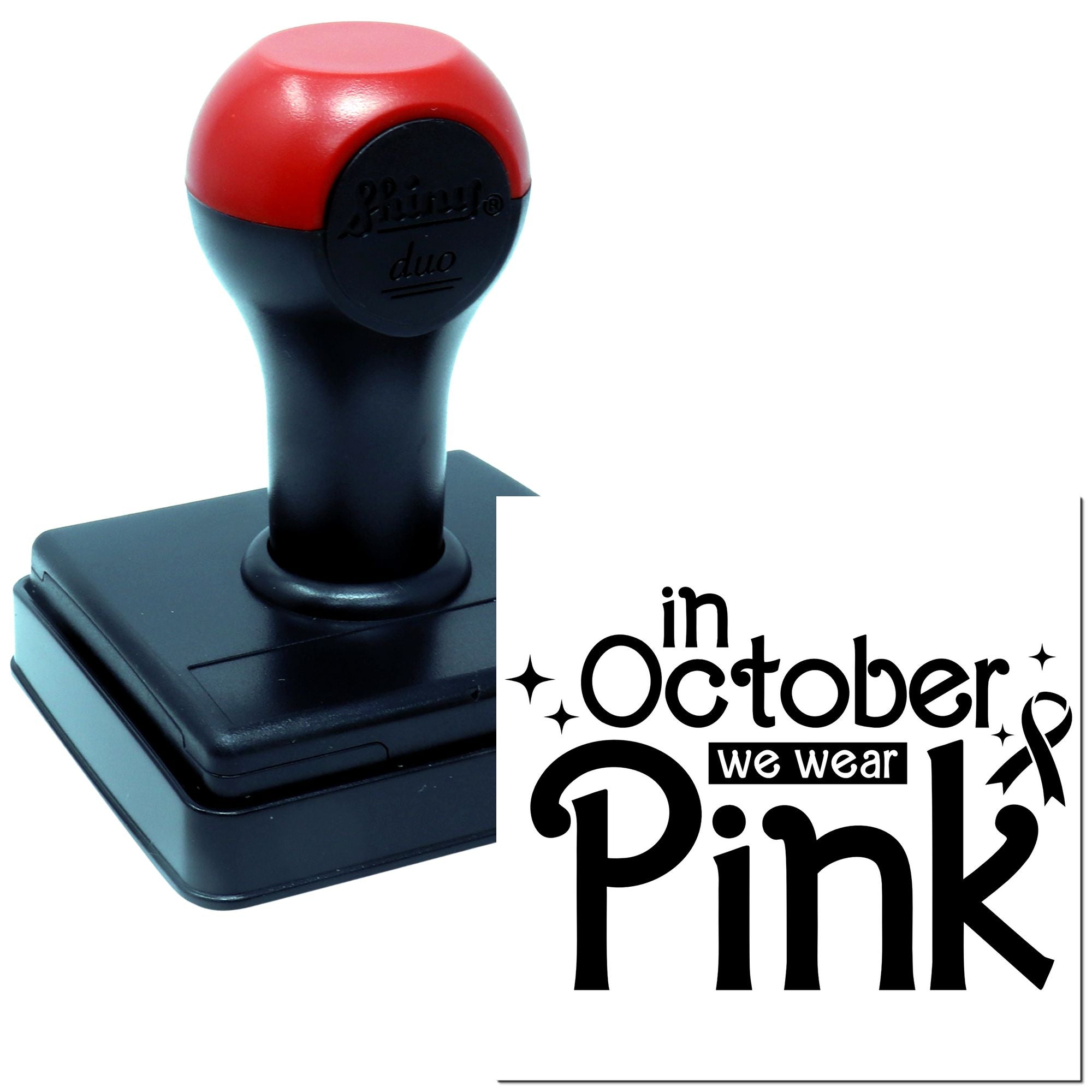 Self-inking rubber stamp for breast cancer awareness with In October We Wear Pink design.