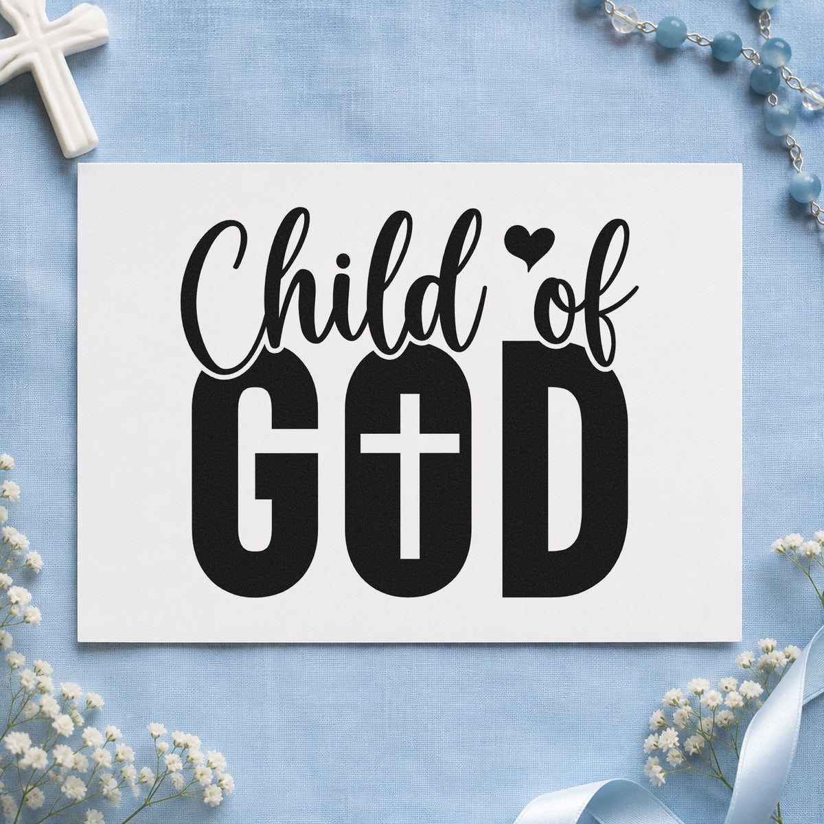 Child of God craft stamp imprint in black ink on a handmade project, one idea being nursery wall art.