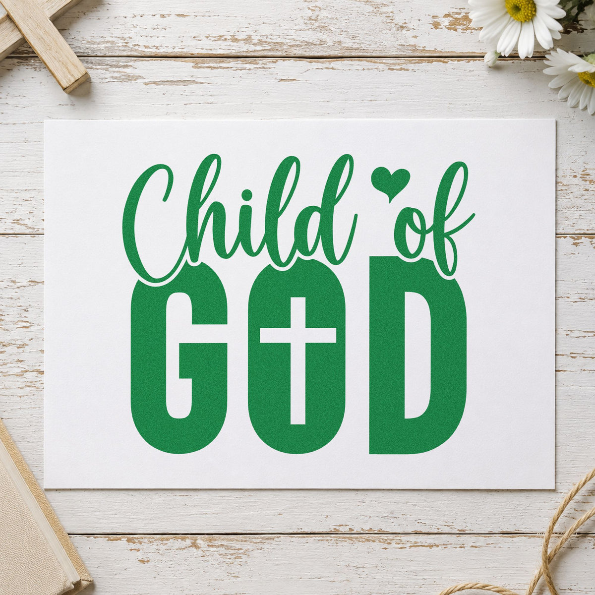Child of God craft stamp imprint in green ink on a handmade project, one idea being confidence notes.