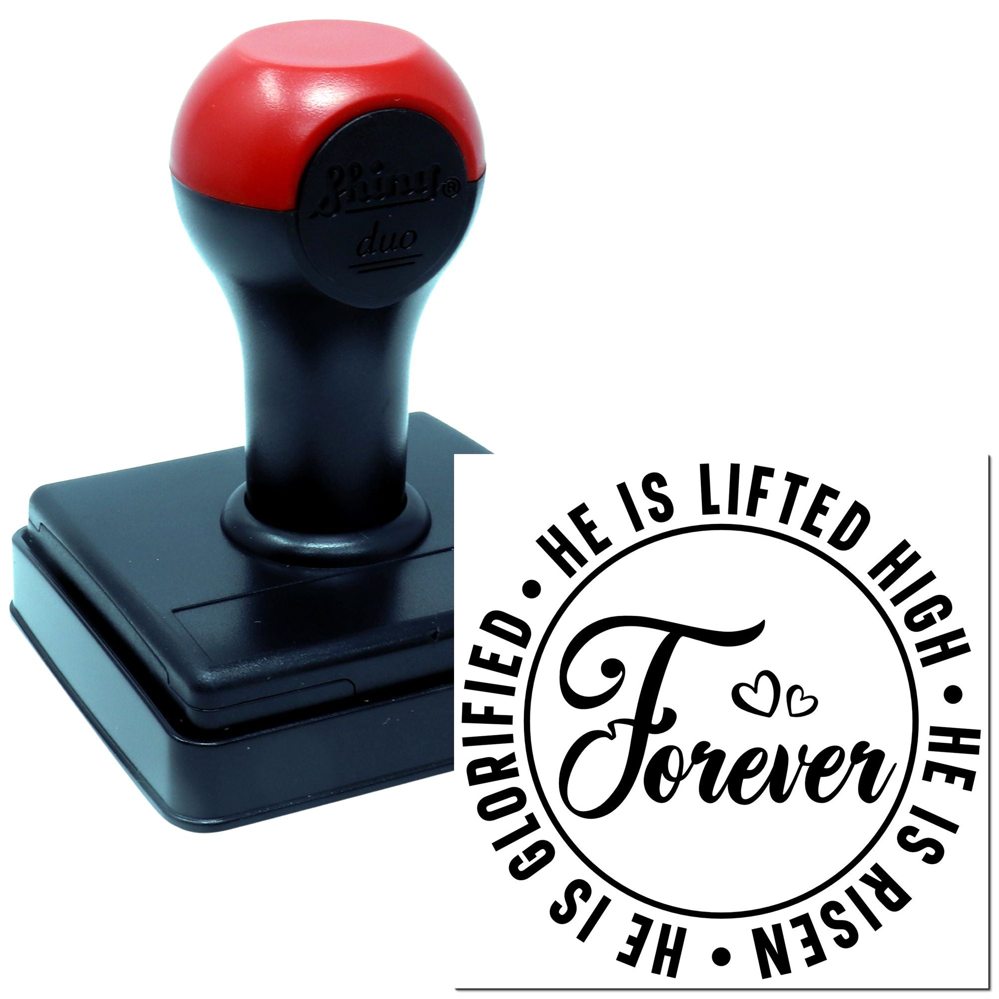 Self-inking rubber stamp with Christian Easter design, imprint reading He is lifted high, He is risen, He is glorified, forever.