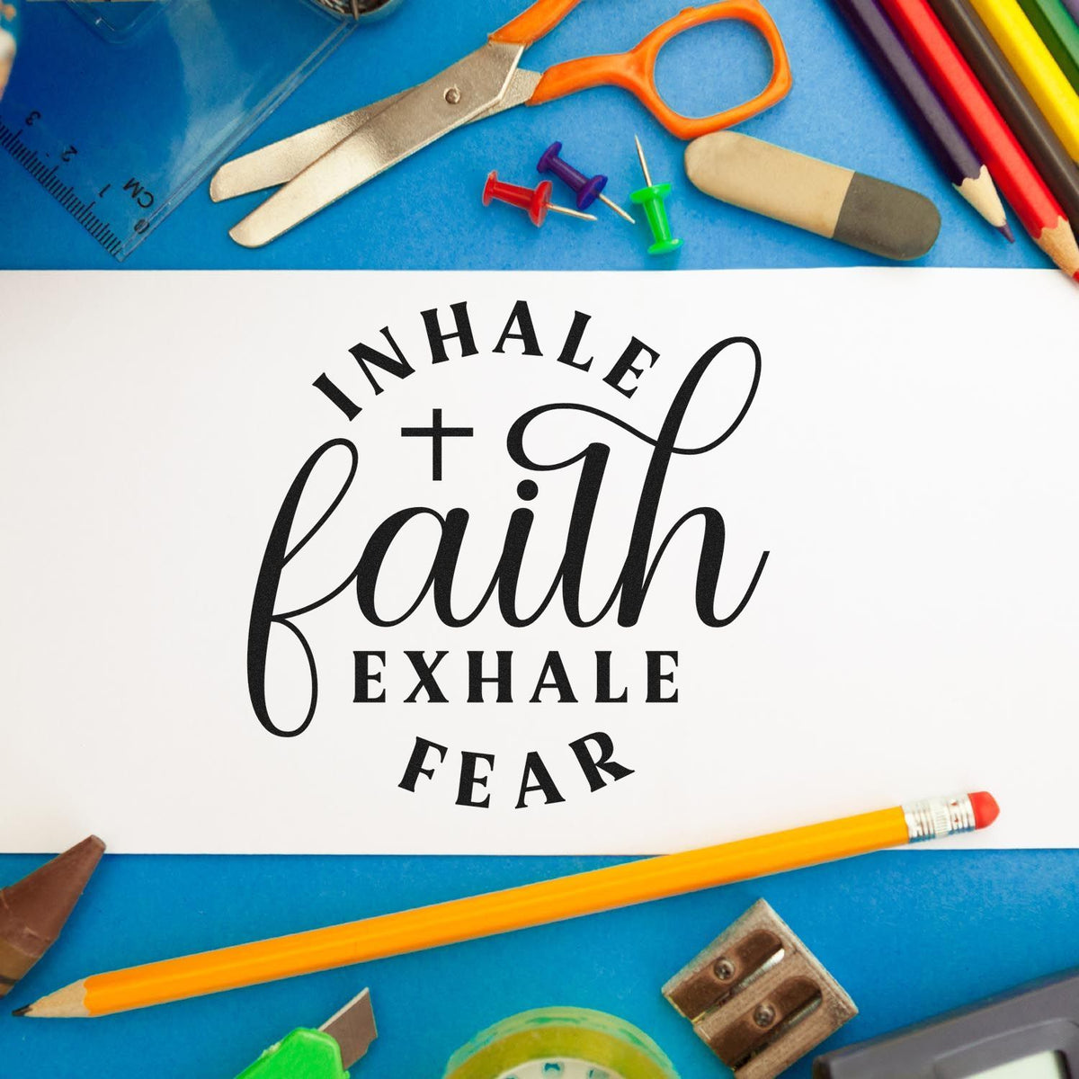 Inhale Faith, Exhale Fear With Cross Rubber Stamp – Wood Handle imprint stamped in black ink. A small cross sits within "Inhale faith, exhale fear," with "Faith" in large script.
