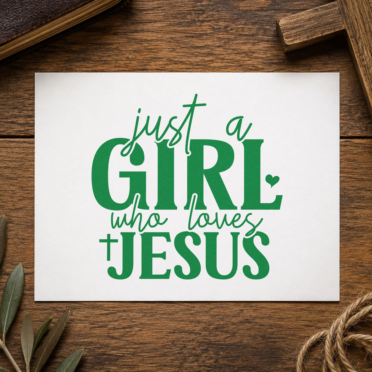 Just a Girl Who Loves Jesus craft stamp imprint in green ink on a handmade project, one idea being retreat tees.