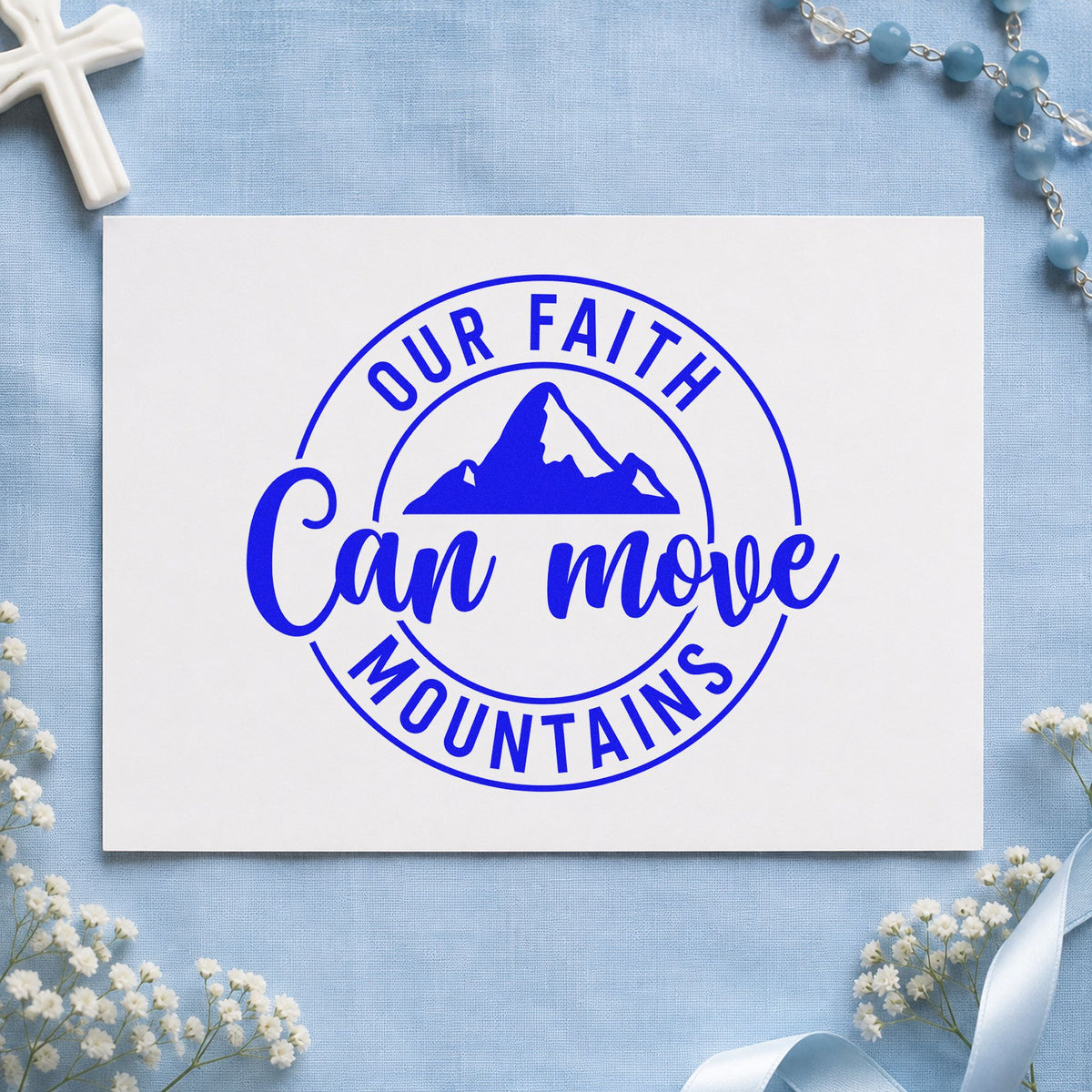 Faith Can Move Mountains craft stamp imprinted in blue ink on paper, a design suited to water bottle labels.