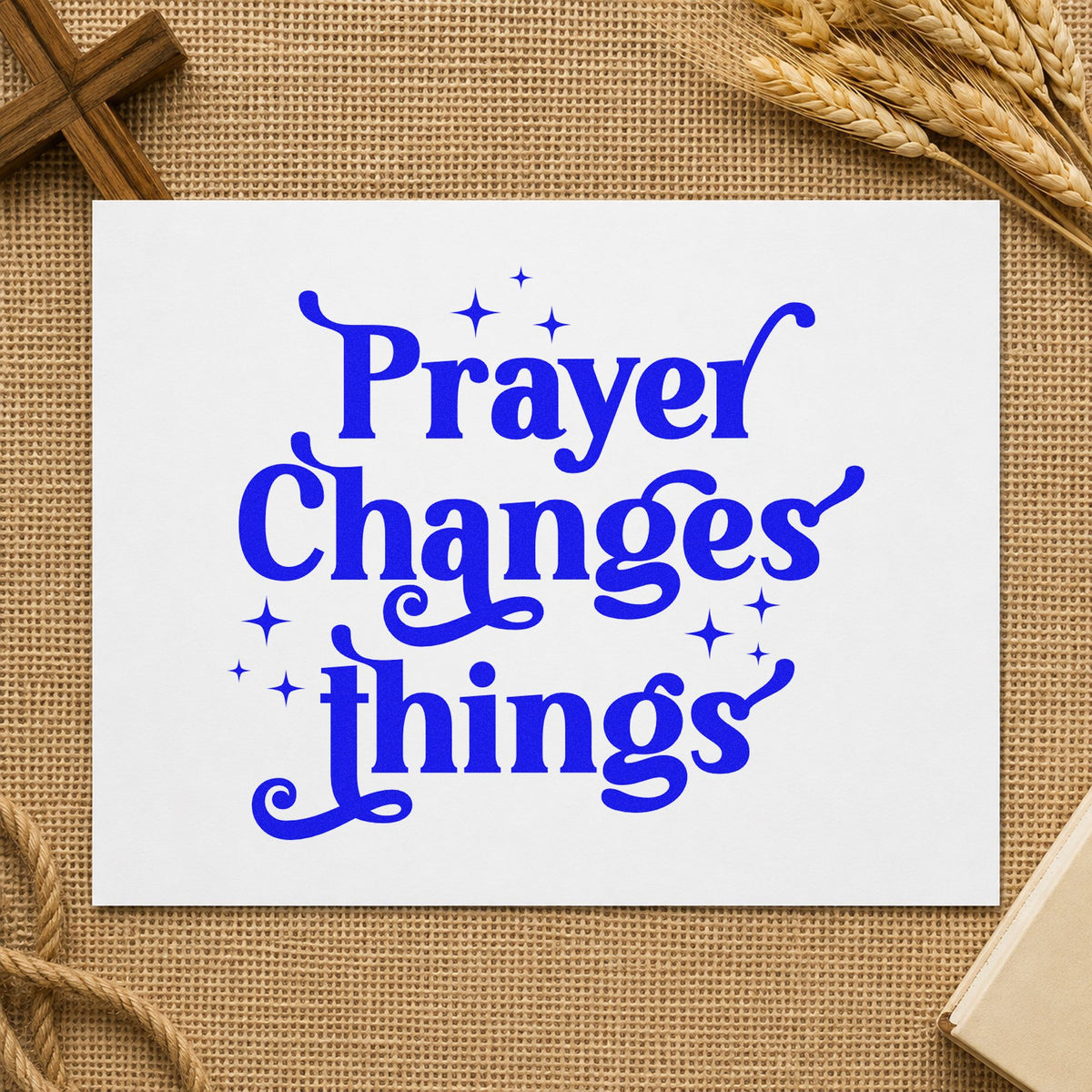 Prayer Changes Things craft stamp imprinted in blue ink on paper, a design suited to journal cover stamping.