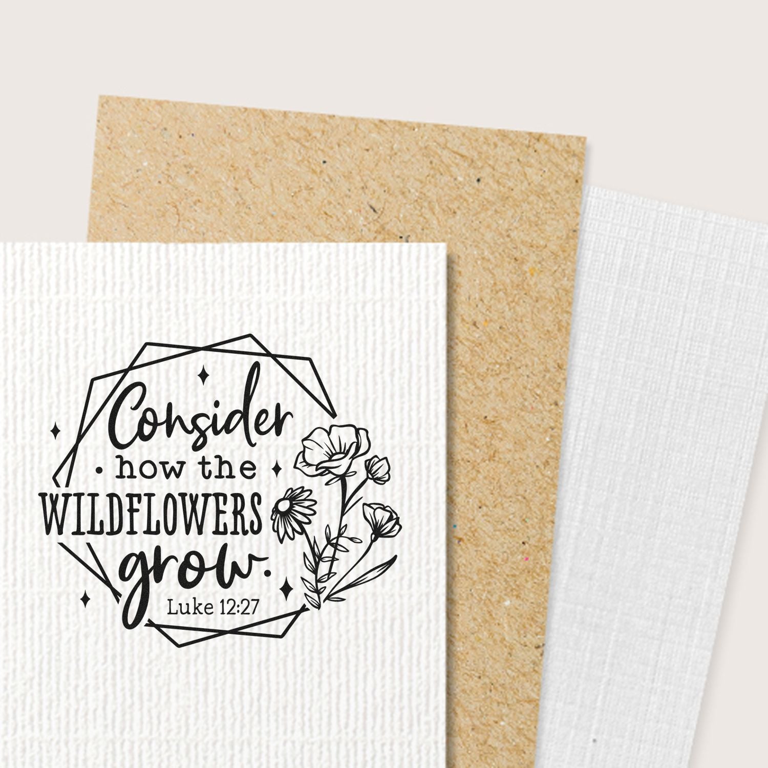 Christian rubber stamp with floral quote, Consider how the wildflowers grow from Luke 12:27 on textured cardstock.