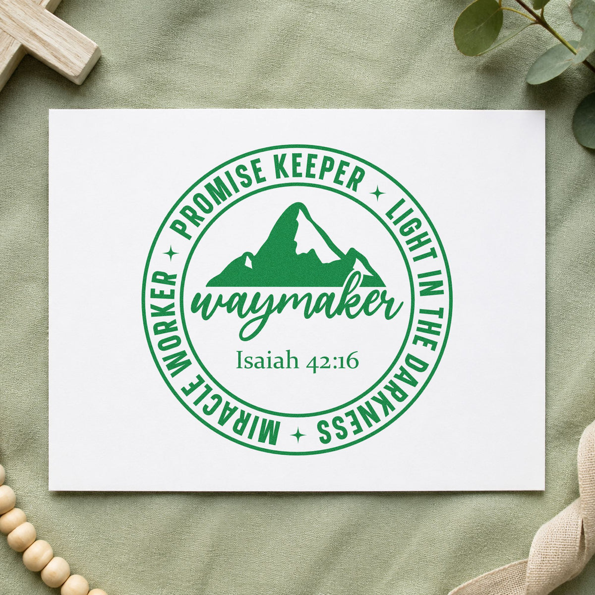 Waymaker Mountain Badge craft stamp imprint in green ink on a handmade project, one idea being framed wall art.